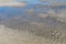 Blue sky reflected in tide pools on the beach, Tybee Island Georgia, USA