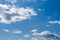 Blue sky with stratocumulus and cumulus clouds on a day