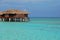 Blue sky turquoise water exclusive luxury Overwater Bungalow for your next Exotic vacation Destination at resort island Maldives