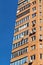 Blue sky and wall of multistorey house