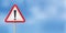 Blue sky warning traffic sign