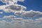 Blue sky with white air and lush clouds