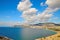 Blue sky and white clouds above the Bay on the Black sea in the Crimea, on the beach in Sudak.