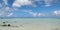 Blue sky, white clouds, beach