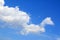 Blue sky with white clouds. Clear sky and cloud pattern. Only dramatic and beautiful sky background. Summer sky and spring sky.
