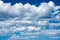 Blue sky with white clouds, cloudscape clear cloudy sky with cumulus clouds. beautiful background backdrop wallpaper