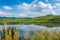 Blue sky, white clouds and grassland lakes