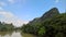 The blue sky and white clouds, green mountains and rivers