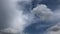 Blue sky white clouds. Puffy fluffy white clouds. Cumulus cloud scape timelapse. Summer blue sky time lapse. Dramatic majestic