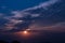 Blue sky with white clouds on sunset. Many little white clouds creating a tranquil weather pattern on the blue background