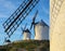 Blue sky and windmills in the background, Consuegra