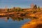 A blue sky and a wonderful reflection of trees and sky in the water