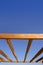 Blue sky wooden golden awning beams