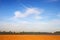 Blue sky and yellow sand.