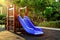 Blue slider under sunlight - children playground