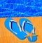 Blue slippers on wooden boards against the background of the pool