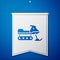 Blue Snowmobile icon isolated on blue background. Snowmobiling sign. Extreme sport. White pennant template. Vector