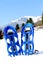 Blue snowshoes in the mountain