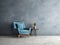 Blue snuggle chair and stone end table in empty room. Minimalist interior design of modern living room