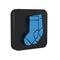 Blue Socks icon isolated on transparent background. Black square button.