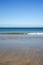 Blue soft waves lashing onto ballybunion beach