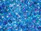 Blue sparkles. Blue glitter background. Elegant abstract background brilliant shimmer. Vector illustration