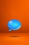 Blue speech bubble on orange vertical background