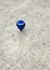 Blue spinning top, toy for children, a type that can rotate on one end, its gravitational center with a gyroscopic effect