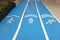 Blue sport running track with sign walk, jogging or run