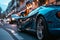 A blue sports car parked on the side of the road, showcasing its sleek design under the natural sunlight, A shiny, blue sports car