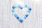 Blue square glass tiles forming heart shape for valentineâ€™s day