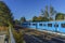 Blue SRT train passing through the countryside of Scarborough, Ontario, Canada