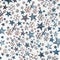 Blue stars and snowflakes pattern on white background. Top view. Creative holiday concept. Flat lay. White blue colors. Winter