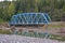 Blue steel railroad bridge