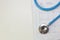 Blue stethoscopes and  Electrocardiography  chart close up image