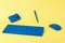 Blue stylish virtual workplace equipment on a yellow background