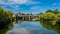 Blue summer sky reflecting on the River Nith in Dumfries