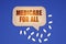 On the blue surface of the tablet and a cardboard plate with the inscription - Medicare For All