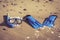 Blue Swim flippers, mask, snorkel for surf laing on the sandy beach. beach concept