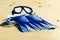 Blue Swim flippers, mask, snorkel for surf laing on the sandy beach. beach concept