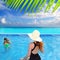 Blue swimming pool caribbean view mother daughter