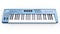 Blue synthesizer MIDI keyboard on white background. Synth keys close-up. 3d rendering