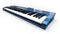 Blue synthesizer MIDI keyboard on white background. Synth keys close-up. 3d rendering