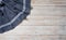 Blue tablecloth, napkin, rough fabric texture with creased folds on wooden desk top view