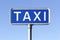 Blue taxi sign