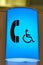 Blue telephone for handicap sign