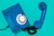 Blue telephone rings with handset off