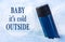 Blue thermo mug and quotation `Baby it`s cold outside`