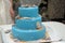 Blue three-tiered cake