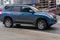 Blue Toyota Land Cruiser Prado car moving on the street. Compliance with speed limits on road concept. Rushing famous premium suv